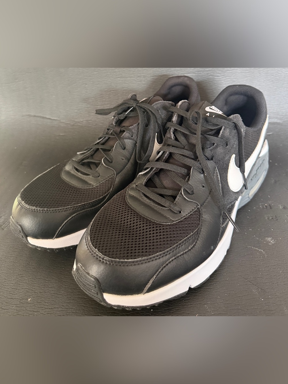 Nike Men’s Black with White Swoosh Athletic Sneakers